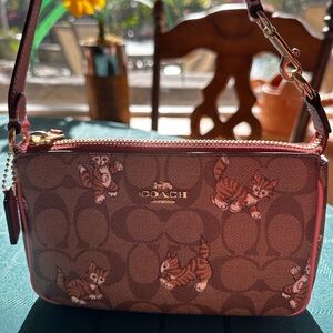 Charming and Chic: The Coach Nolita 19 Dancing Kitten Purse New without tag